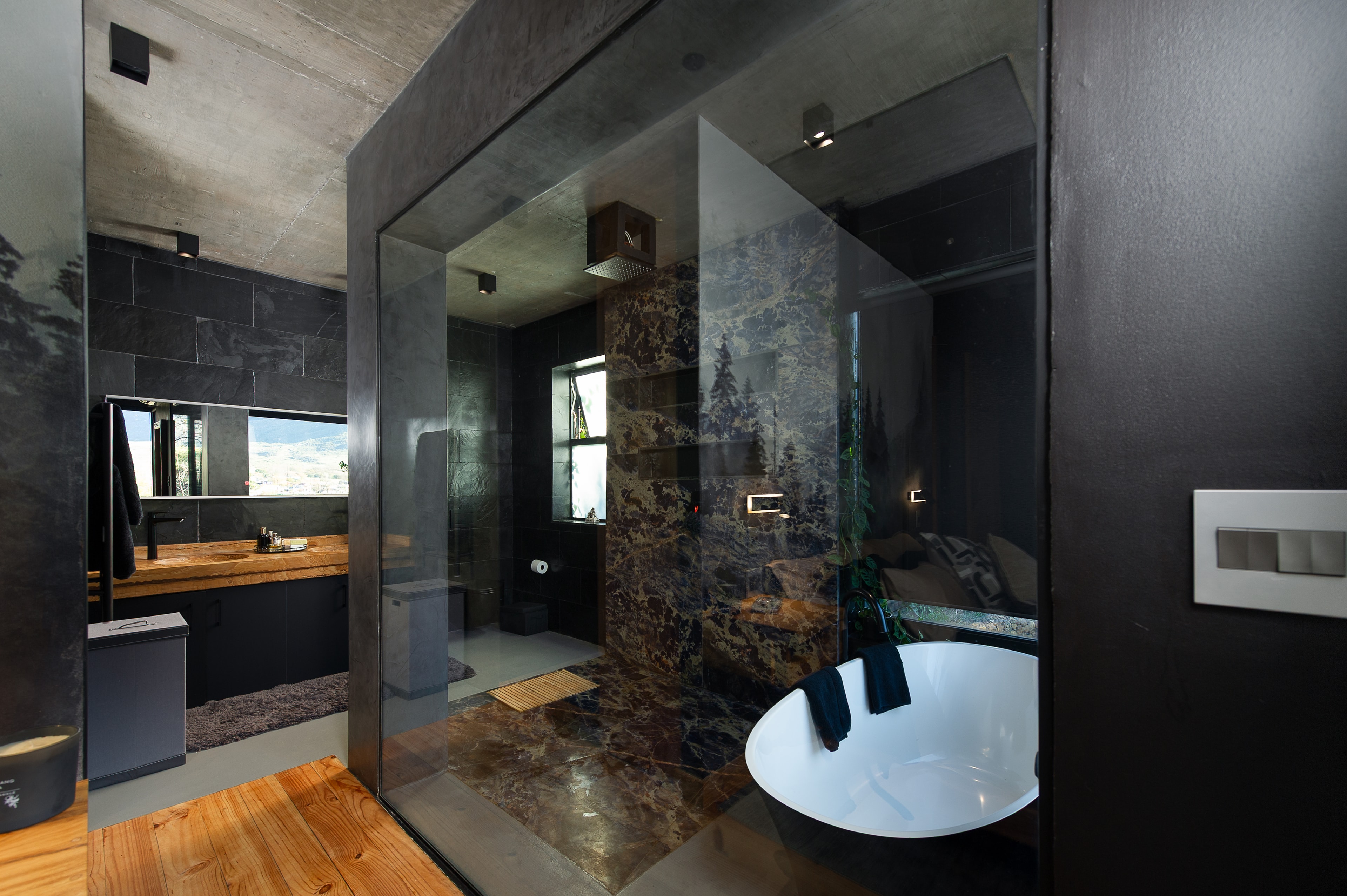 Luxury bathroom with marble and glass shower