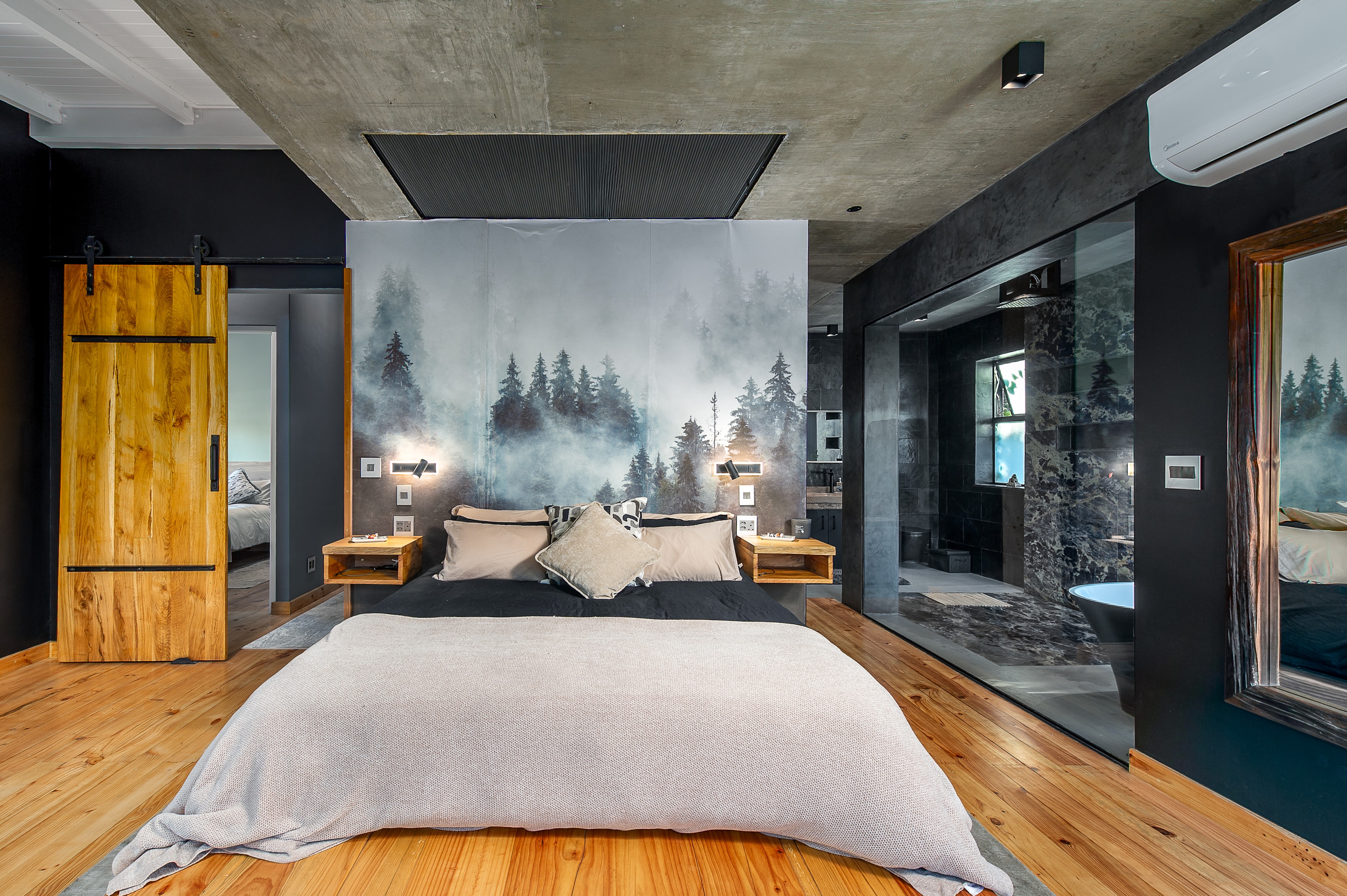 Bedroom with forest mural wall