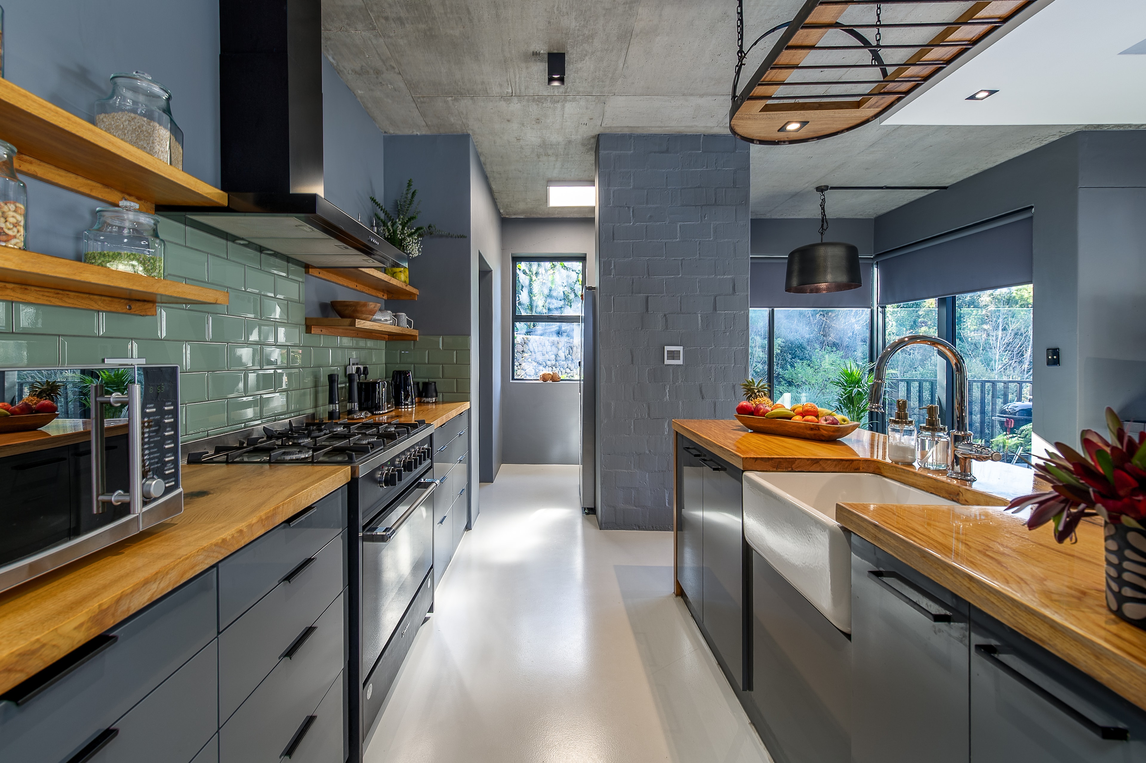 Kitchen with sage green tiles