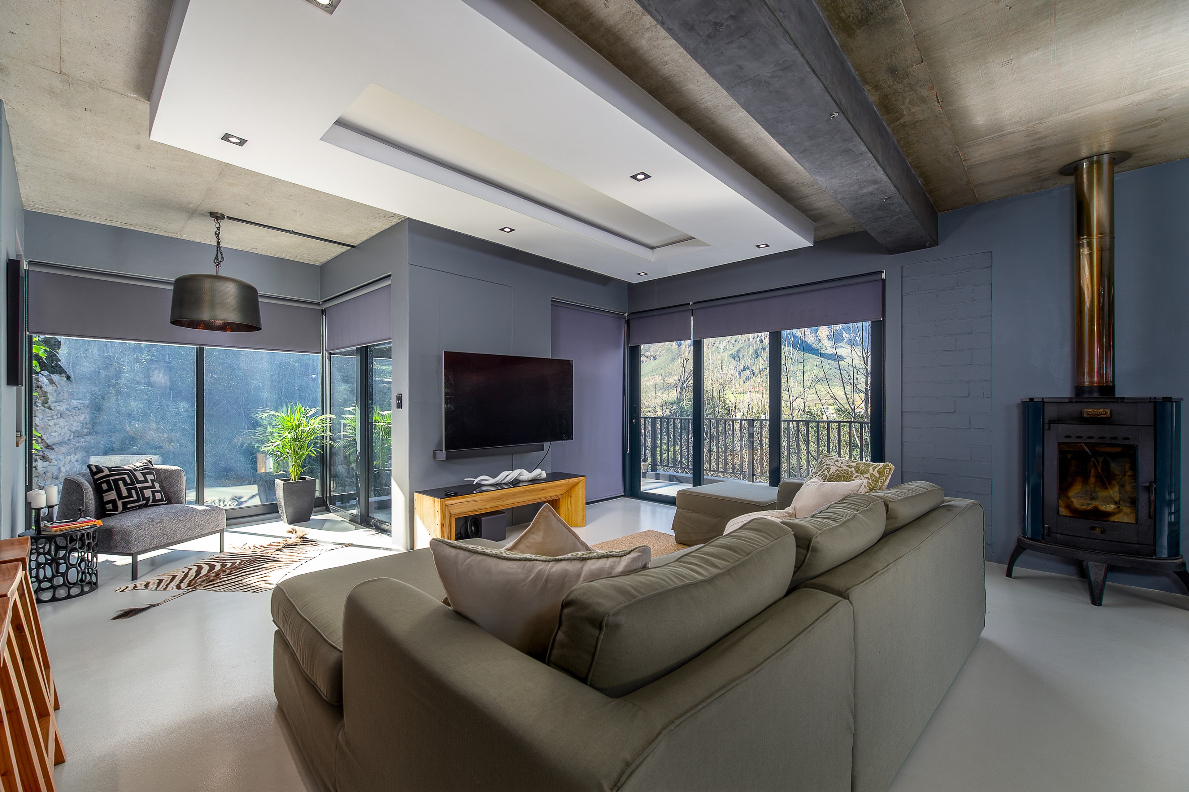 ForestFall — living room with fireplace and mountain views