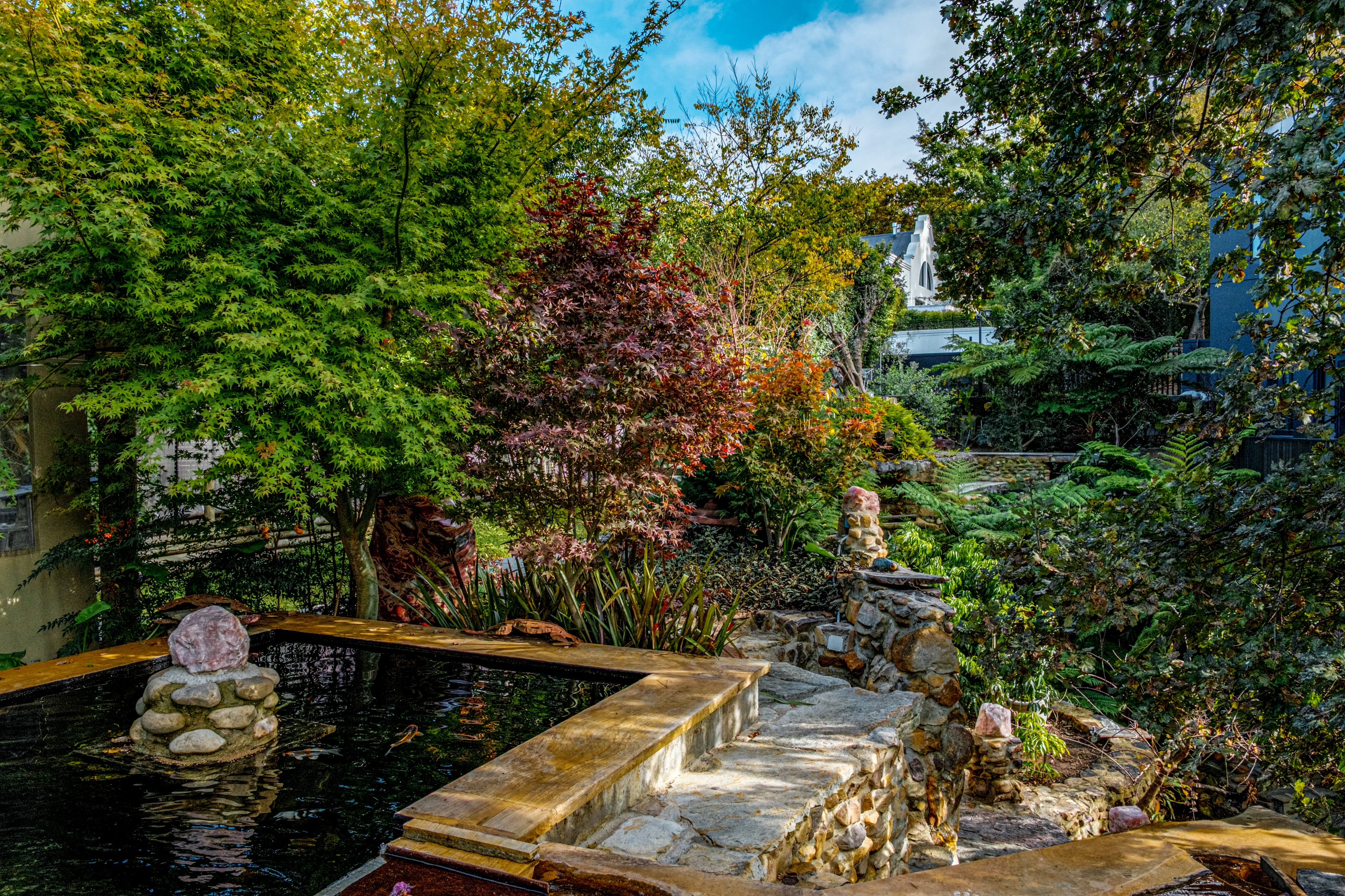 Garden water feature and stone pathway